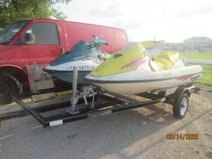 lot 112 image: 2 BOMBARDIER GTI SEA-DOO JET SKIS AND TRAILER WORKING CONDITION UNKNOWN (LOST TITLE BILL OF SALE ONLY)