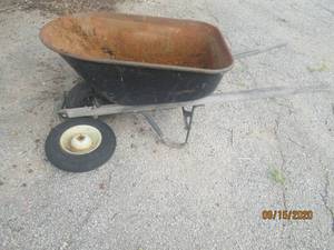 lot 145 image: TRUE TEMPER WHEEL BARREL WITH SPARE TIRE AND RIM