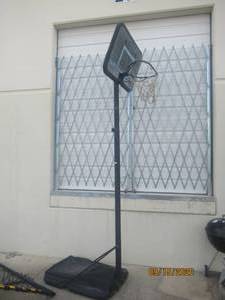 lot 221 image: BASKET BALL HOOP IN ROUGH CONDITION