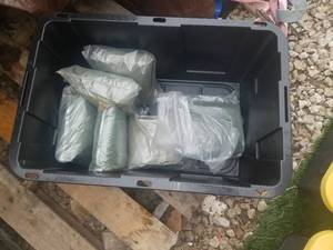 lot 41 image: Dark Green rain jackets.  BIN NOT INCLUDED