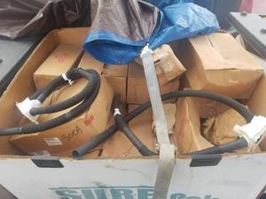 lot 84 image: Pallet of Whirlpool drain hose assemblys  PLASTIC PALLET NOT INCLUDED