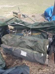 lot 92 image: US Army Pallet of tent pole kits