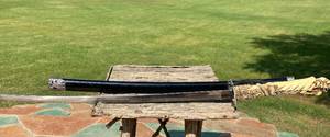 lot 12 image: Sword - sharp blade - wall hanger