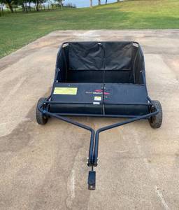 lot 102 image: Pull Behind Leaf Rake