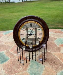 lot 115 image: Large Wall Clock with free standing candle holder