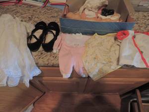 lot 109 image: Assorted doll clothes and shoes