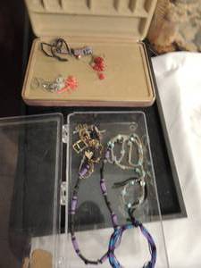 lot 350 image: Musical jewlery  box with earrings, christmas lights, skelaton, small aqua pierced earrings, shell doveon silver chain, bead bracelet  beaded necklace plus
