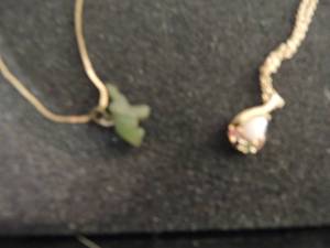lot 353 image: Necklace x 2 -with green elephant and one with Faux opal