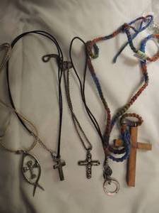 lot 359 image: .925 cross 1.25 on 16 chain, Ichthys with cross 2.25 on cording, wood cross 3 on  cording and 1 cross on leather cording
