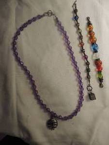 lot 377 image: 22 purple bead necklace with pendant     bead bracelet silver box 7 and beaded band bracelet elastic 6