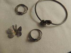 lot 364 image: Silver heart cuff bracelet and . Silver butterfly 34, Infant feet ring size 6.5 .925 and interlocking rings.925