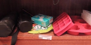 lot 234 image: Rubber ice trays and jello molds gloves and 2 tea tumblers