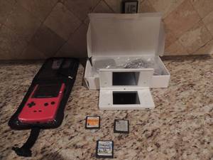 lot 183 image: Nintendo DS NIB charger and paperwork included 2 GAMES     Game boy in case red with one Tetris game