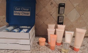 lot 146 image: Clinique body lotion and scrubs (used) perfume and 3 boxes of Mirad face cleaning treatments new