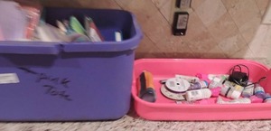 lot 155 image: Purple and pink tub with craft supplies, paints, paper, etc.