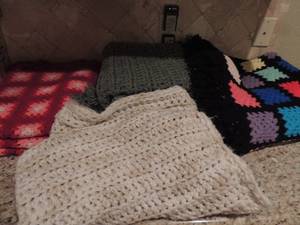 lot 152 image: Hand knitted throws- 1 green, 1 tan, 1 red and pink and 1 multi color
