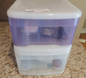 lot 143 image: 2 stackable plastic container with makeup mirrors and nail polish