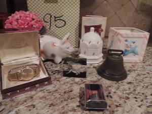 lot 95 image: Timex 21 in original box, 1873 bell brass, hallmark keepsake piano, porcelain pig and more