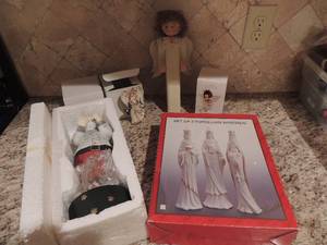 lot 204 image: 2  light house ornaments in box, wooden angel, Hallmark good tidings angel. Set of porcelain Wiseman, Santa smoking tobacco pipe ceramic music box