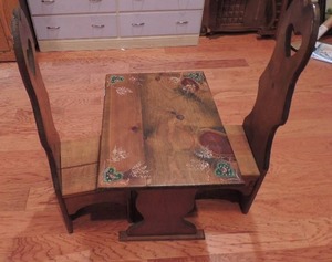 lot 1 image: Childs wooden table 19x23x16 and 2 matching high back chairs 33 x 11 x 12