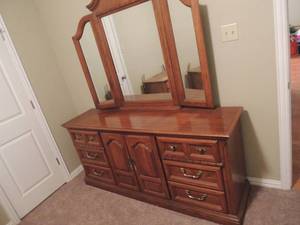 lot 2 image: 9 drawer solid wood dresser 32x70x18 with folding mirror 49x54