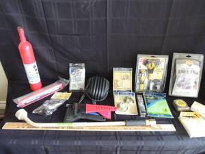 lot 228 image: Yard stick   knee pads    bulb changer   closet rod ends new water blade window scrapers