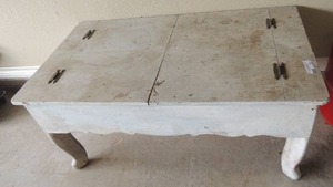lot 221 image: White patio table top has 2 doors that open for storage 19x42x23