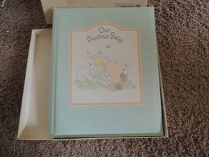 lot 129 image: Precious memory baby book New in box
