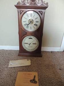 lot 5 image: Ithaca calendar clock with original paperwork and key 266x12x5