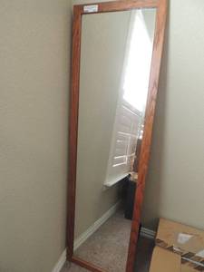 lot 107 image: 56 x 16 brown wall mirror