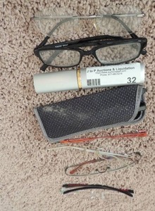 lot 32 image: Assorted eye glasses with 2 cases