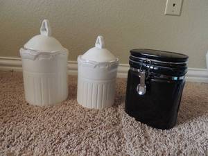 lot 35 image: Canisters 2 white 1 black