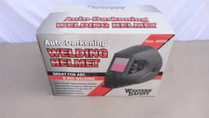 lot 10 image: Western Safety auto-darkening welding helmet
