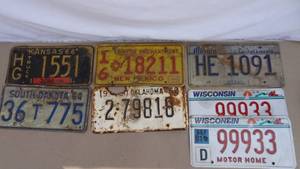 lot 206 image: Lot of 7 license plates - Kansas, South Dakota, Wisconsin, Illinois, New Mexico, Oklahoma