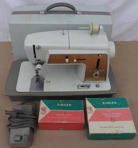 lot 124 image: Vintage Singer Model 603 sewing machine with case, pedal and accessorices
