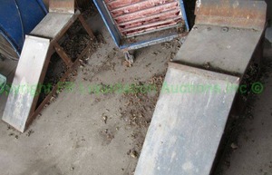 lot 365 image: Steel fabricated vehicle ramps, 2 count. bolted to pavement. BUYER MUST BRING OWN TOOLS AND REMOVE
