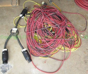 lot 8 image: Hubbell 240 volt split cord and assorted extension cords