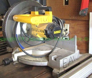 lot 27 image: Dewalt DW705 heavy duty 12 compound miter saw