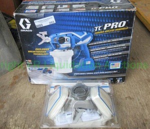 lot 293 image: Graco TC pro corded airless handheld paint spray gun system (used) and respirator