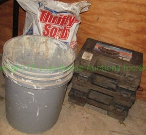 lot 58 image: Quick grip tire chain sets (3 sets) and Thrifty sorb absorbent media