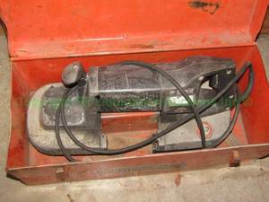 lot 72 image: Black & Decker portable band saw in storage case