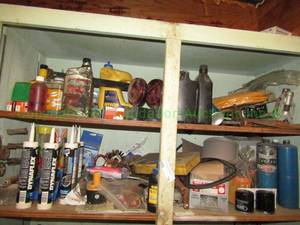 lot 75 image: Contents of top two shelves including hardware, silicone, parts and more as shown