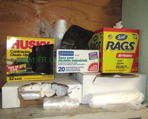 lot 85 image: Husky contractor clean up trash bags, Scot rags in a box and plastic trash bags as shown
