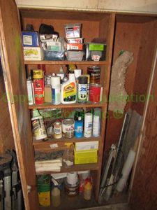 lot 90 image: Cabinet (40 x 13 x 81) plus contents of cleaning, gardening, industrial chemicals