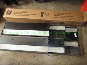 lot 124 image: Fluorescent lamp bulbs and under cabinet utility lamp fixtures