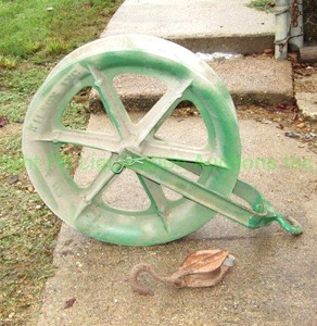 lot 156 image: GreenLee oversize pulley approx. 30 wide plus rustic pulley with hook