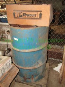 lot 177 image: Panduit flexible hose cover and 55 gallon drum