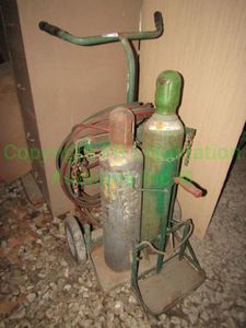lot 190 image: Oxy Acetylene welding tanks, cart, hoses as shown