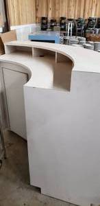 lot 83 image: Curved White Bar Table, W60 x H45 approx., keys not included to cabinets