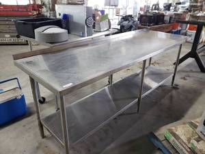 lot 29 image: Stainless Steele Double shelf kitchen work table (W 96 x D 30 approx.)